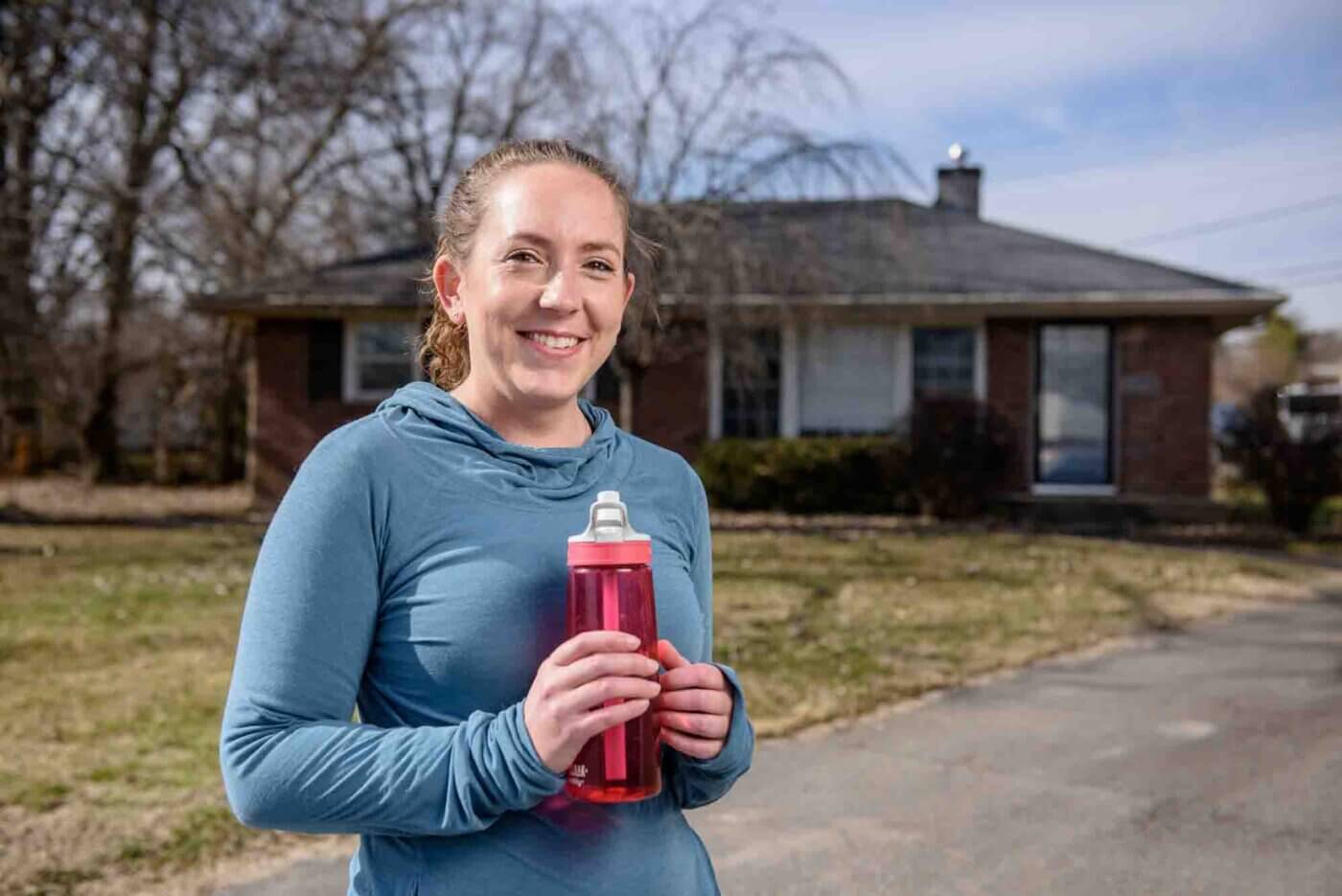 Lindsay Thurman takes care of the dogs at home before going on a run in Cherokee Park Saturday, Feb. 6, 2021, in Louisville, Ky. A return to running was possible for Thurman after a medication change following a 2008 idiopathic pulmonary arterial hypertension (PAH) diagnosis made her breathe easy again.